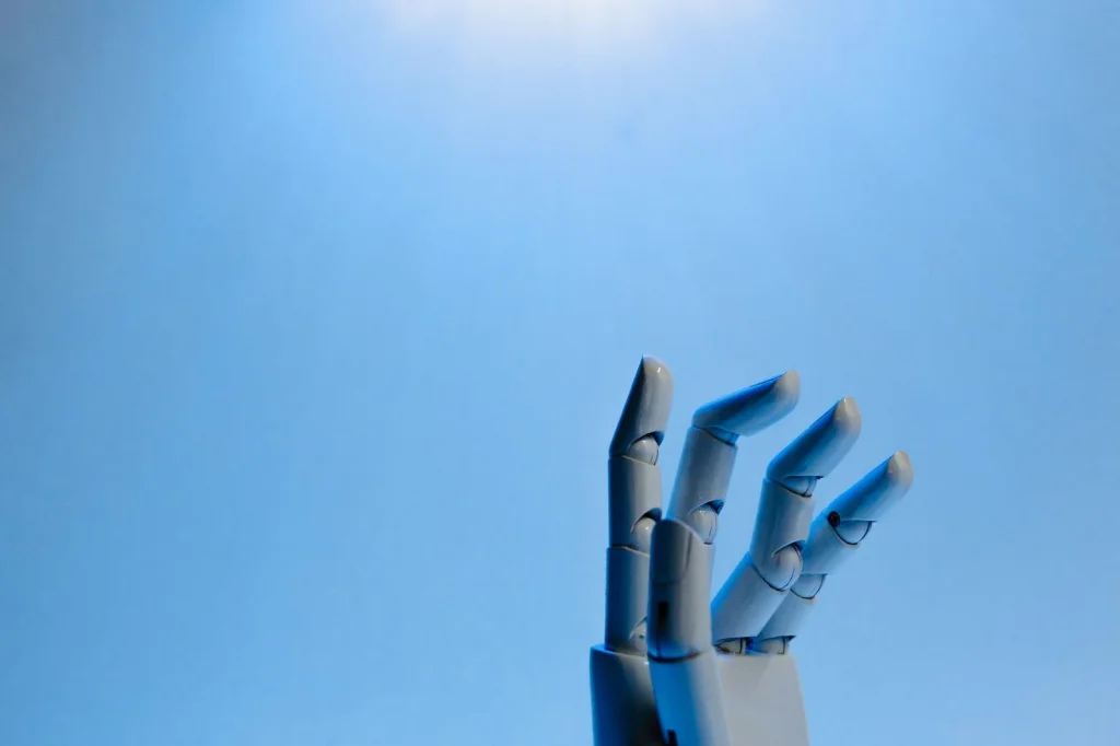 Close-up detail shot of AI-generated hand with six fingers against white background, harsh directional lighting highlighting the digital artifact, macro photography angle, clinical documentation style, high contrast black and white