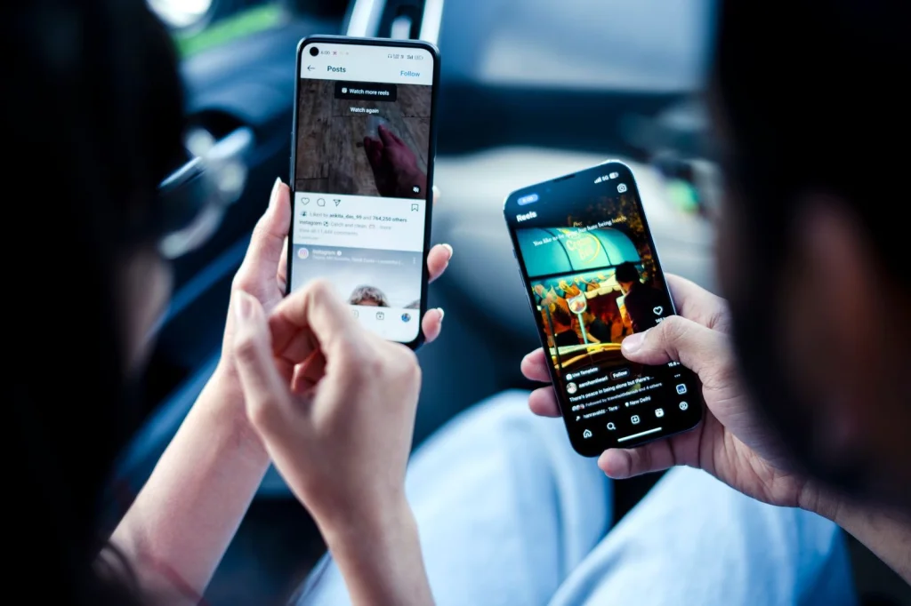 Smartphone screen showing split comparison of woman with different hairstyles, short bob on left and long waves on right, modern UI design with selection buttons, held by hands with manicured nails, soft indoor lighting, overhead shot at f/4, product photography style