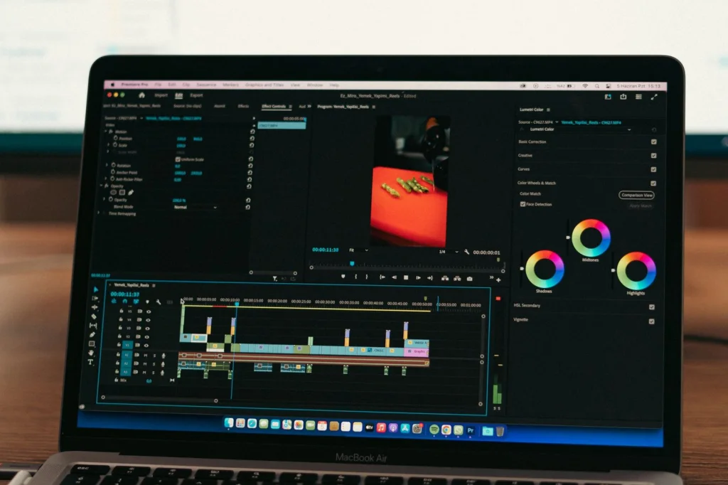 Close-up of laptop screen showing before and after photo editing interface with woman